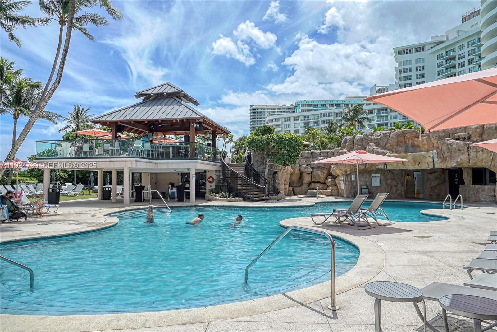 5225 Collins Avenue, Unit 1204 Miami Beach, FL 33140 - Photo 10 of 49 a view of a house with swimming pool