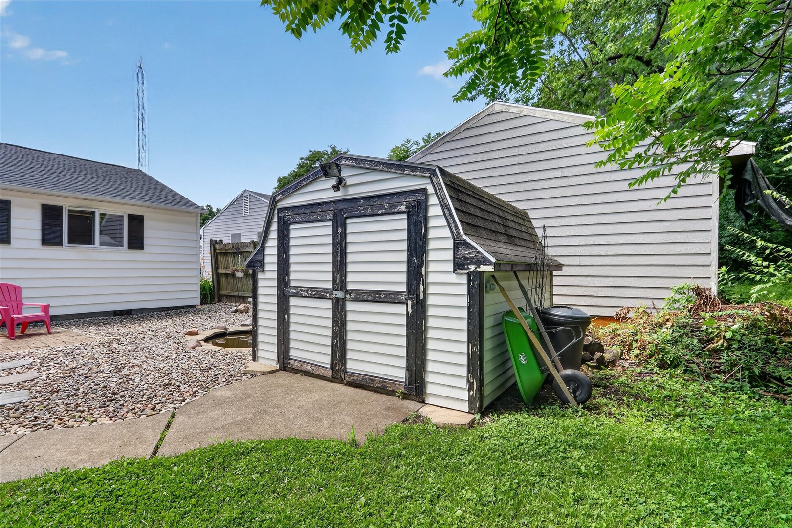 1204 West Violet Street Freeport, IL 61032 - Photo 36 of 36 a view of a house with a yard and plants