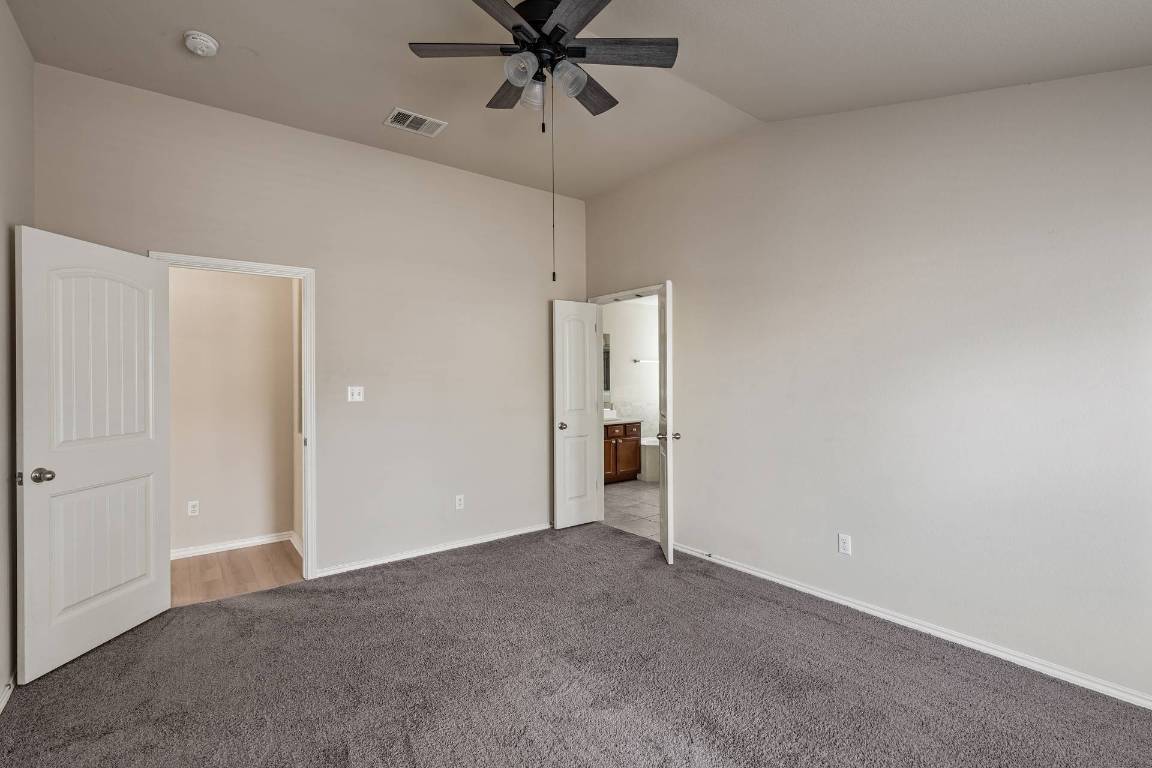 180 Fletcher Bend Buda, TX 78610 - Photo 16 of 36 a view of an empty room