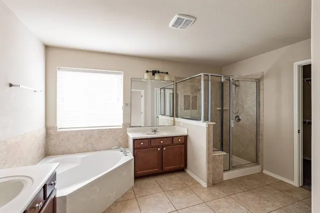 a bathroom with a toilet a sink and a bathtub