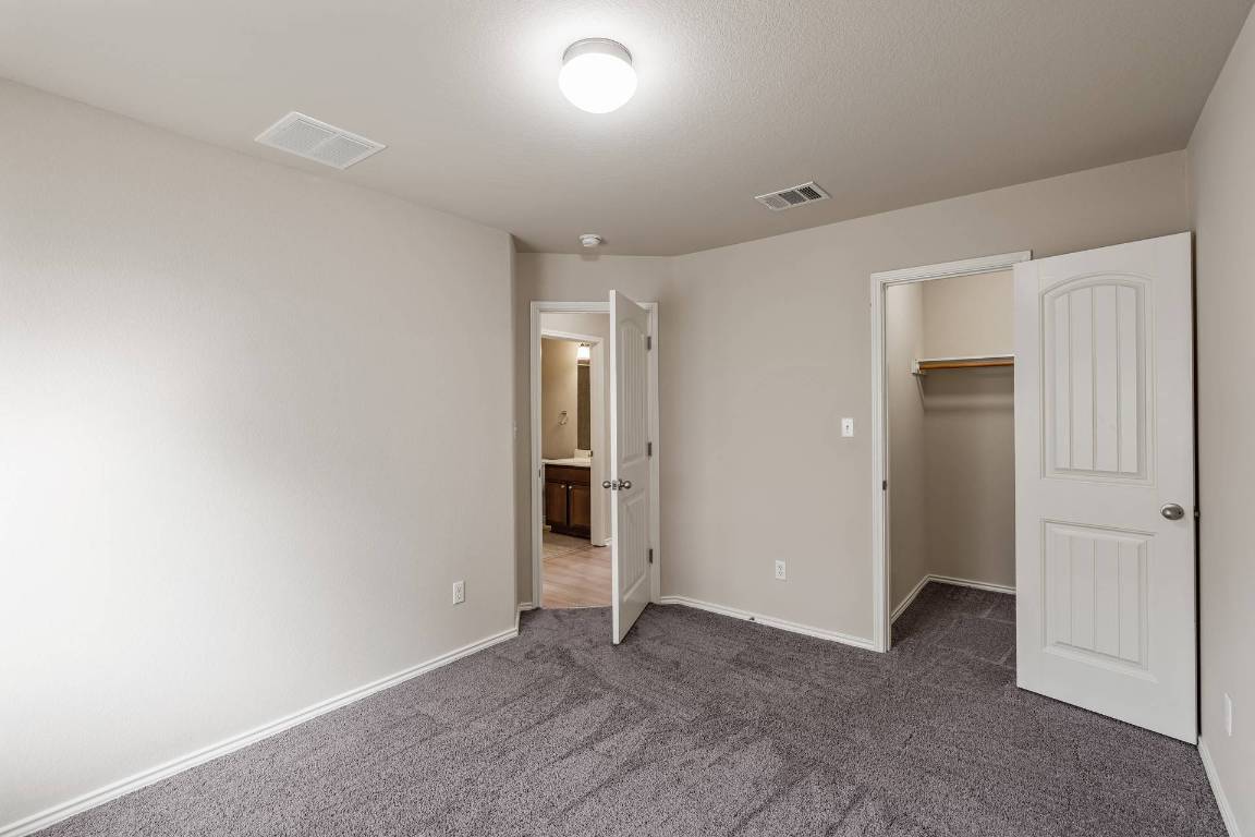 180 Fletcher Bend Buda, TX 78610 - Photo 22 of 36 a view of an empty room