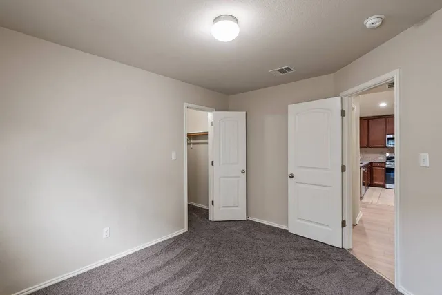 a view of a backyard with sitting area