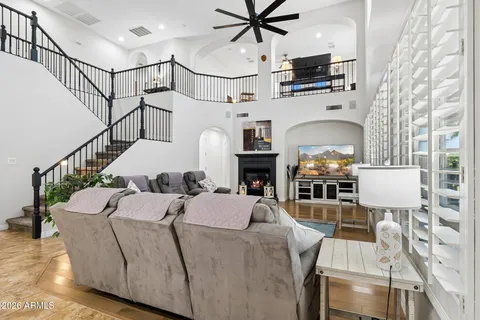 a kitchen with granite countertop a sink and a stove