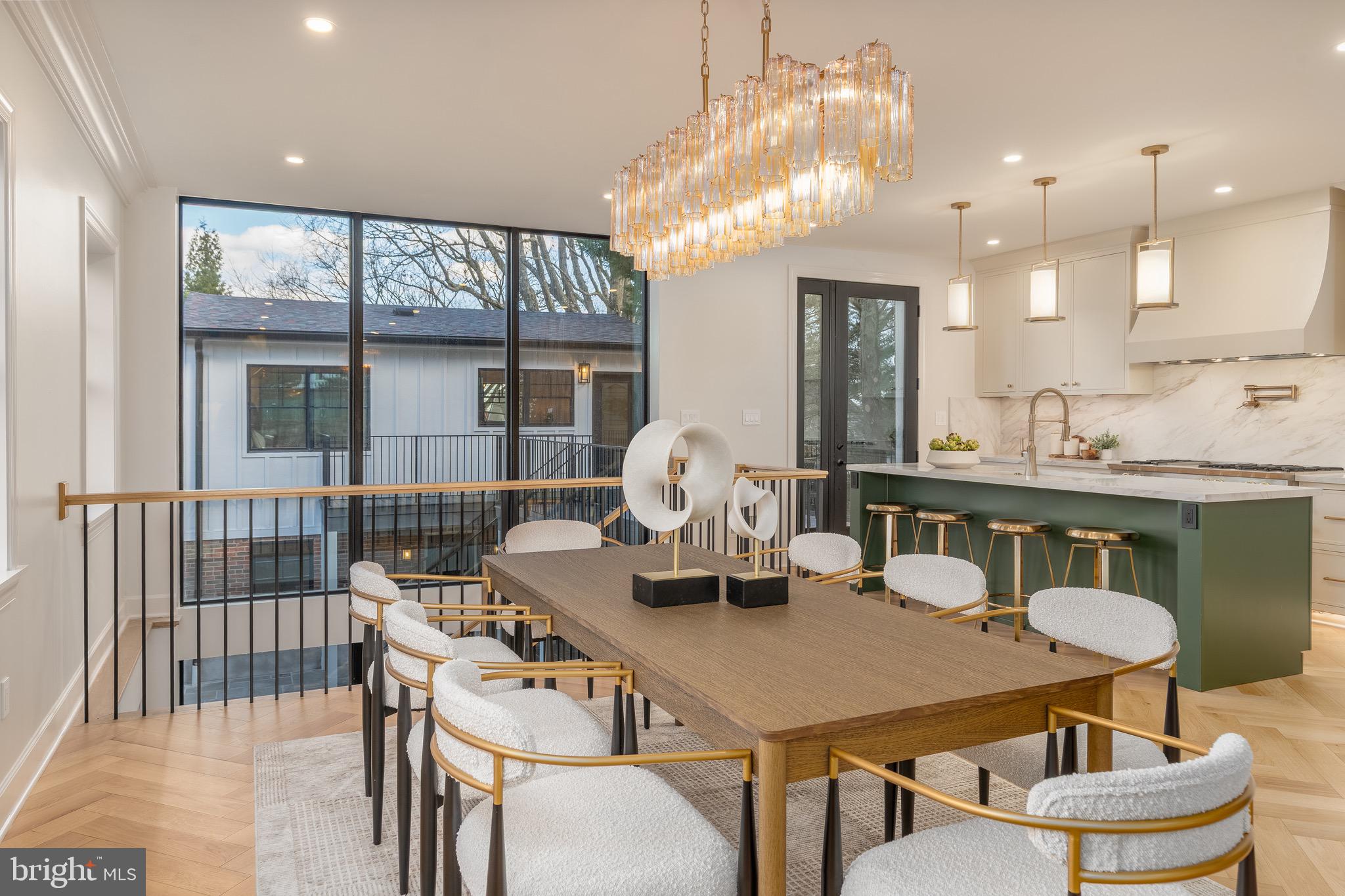 2619 Wisconsin Avenue Northwest Washington, DC 20007 - Photo 12 of 63 a dining room with furniture and a large window