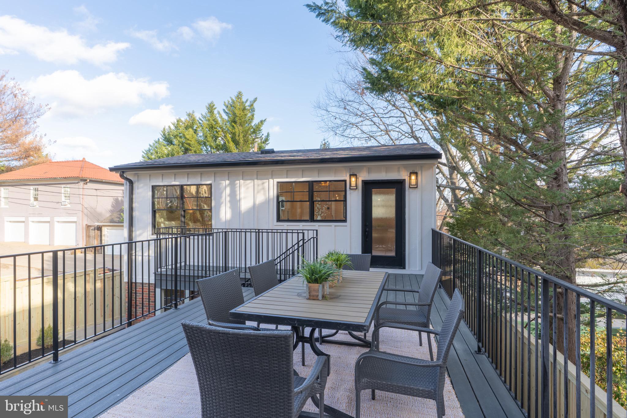 2619 Wisconsin Avenue Northwest Washington, DC 20007 - Photo 18 of 63 a view of a house with patio and wooden floor