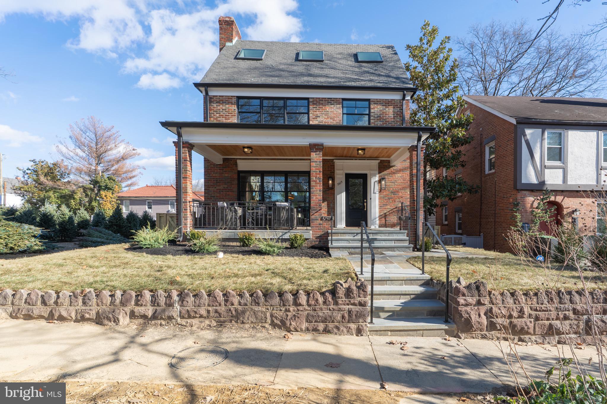 2619 Wisconsin Avenue Northwest Washington, DC 20007 - Photo 3 of 63 a view of a house with sitting area and garden