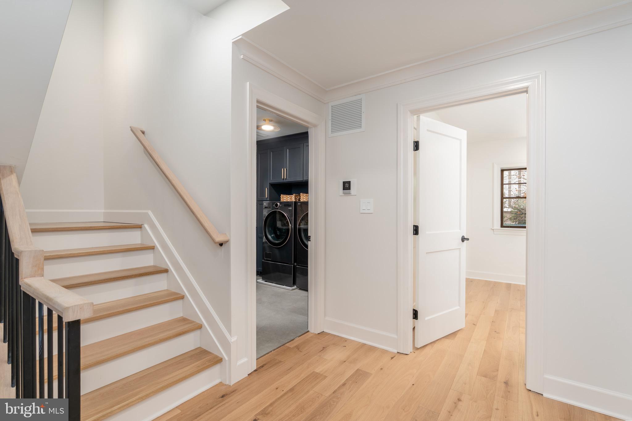 2619 Wisconsin Avenue Northwest Washington, DC 20007 - Photo 33 of 63 a view of a hallway with wooden floor and entryway