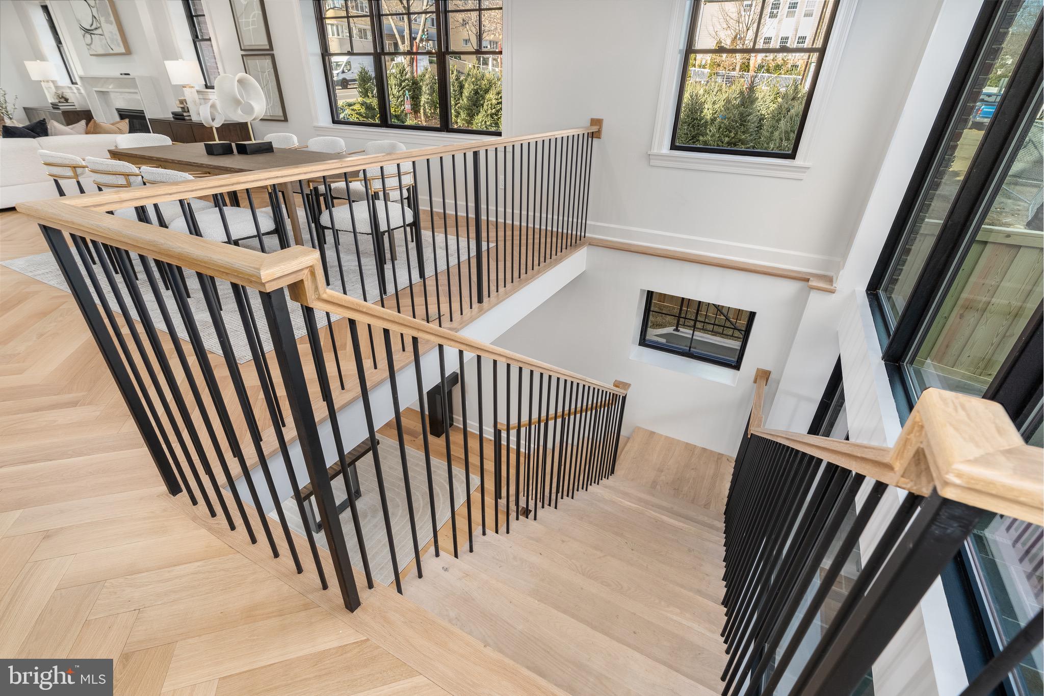 2619 Wisconsin Avenue Northwest Washington, DC 20007 - Photo 39 of 63 a view of staircase with railing and white walls