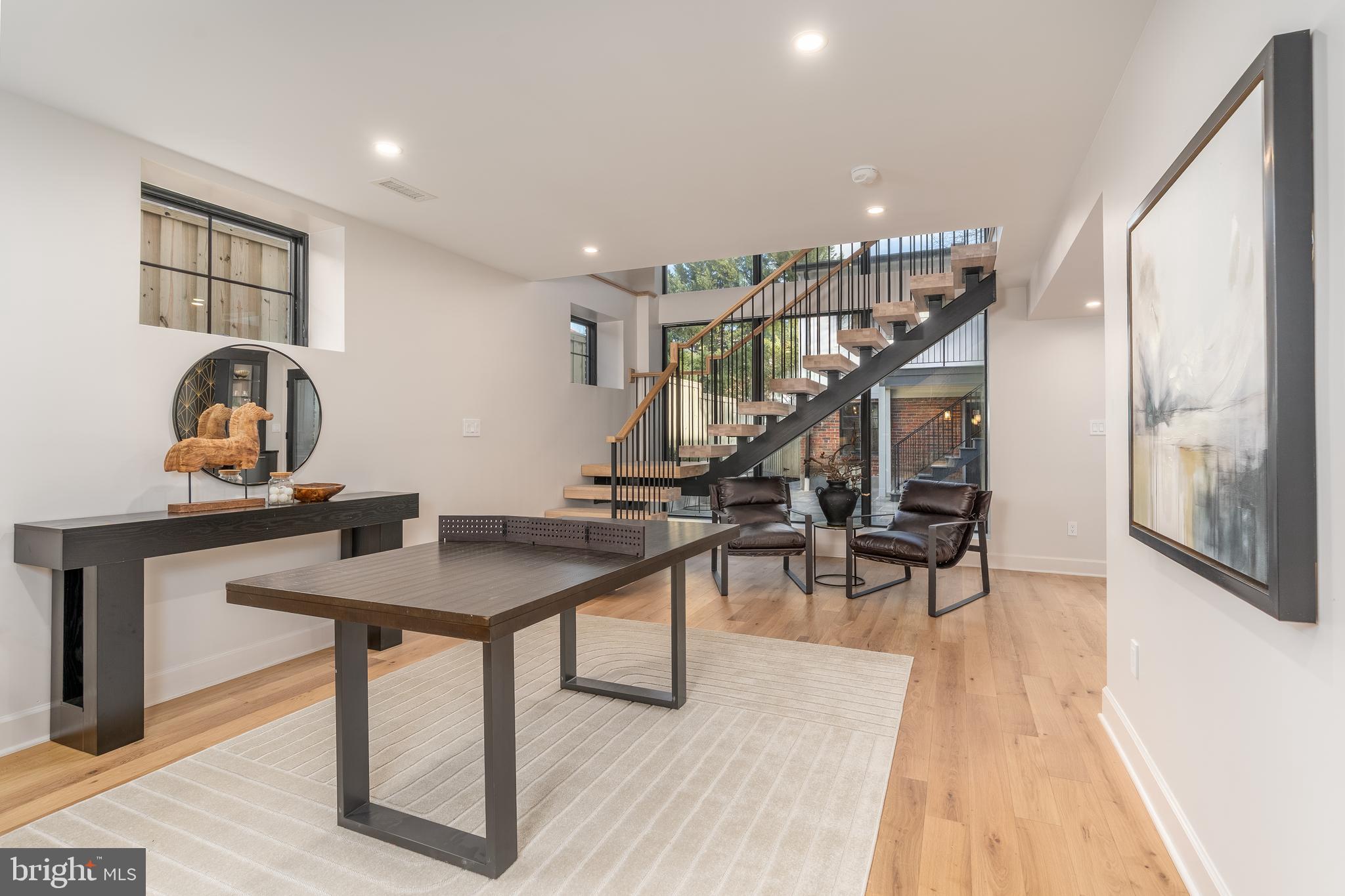 2619 Wisconsin Avenue Northwest Washington, DC 20007 - Photo 41 of 63 a view of a livingroom with furniture and wooden floor