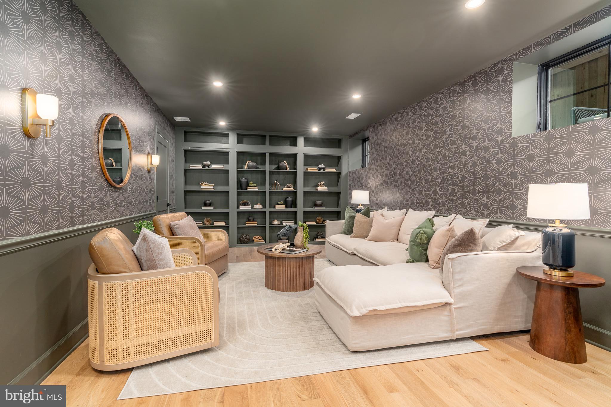 2619 Wisconsin Avenue Northwest Washington, DC 20007 - Photo 44 of 63 a living room with furniture and a fireplace