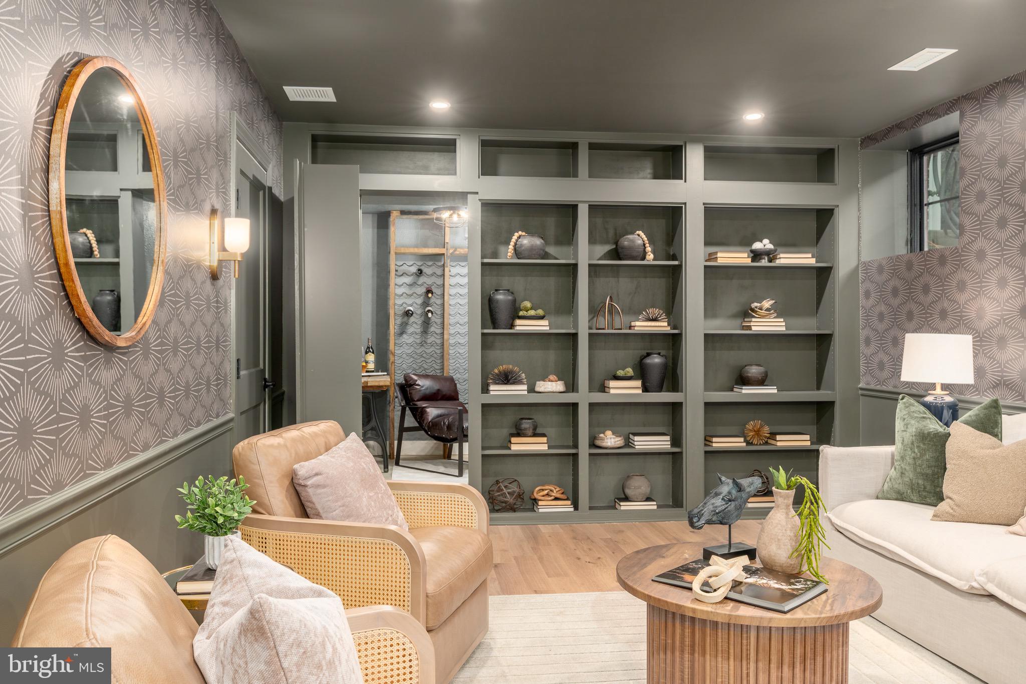 2619 Wisconsin Avenue Northwest Washington, DC 20007 - Photo 47 of 63 a living room with furniture a rug and a chandelier