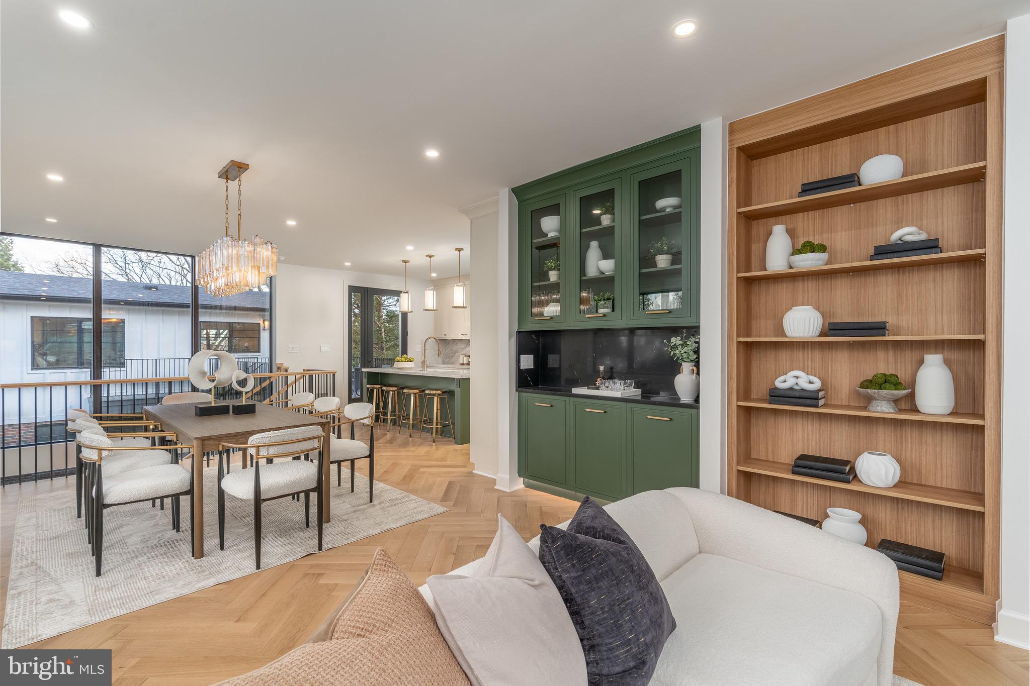 2619 Wisconsin Avenue Northwest Washington, DC 20007 - Photo 10 of 63 a living room with furniture a window and kitchen view