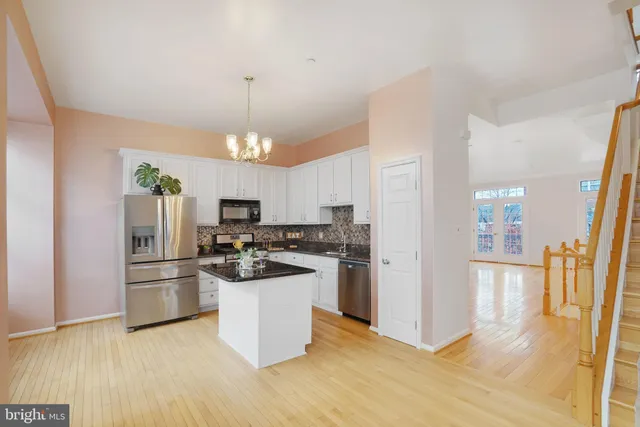 a view of a hallway with windows
