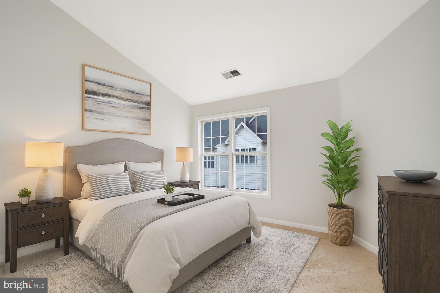 431 Stanton Place Alexandria, VA 22304 - Photo 17 of 36 a bedroom with a bed and a potted plant