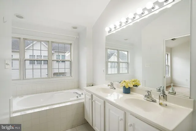 an empty room with an entrance to other room