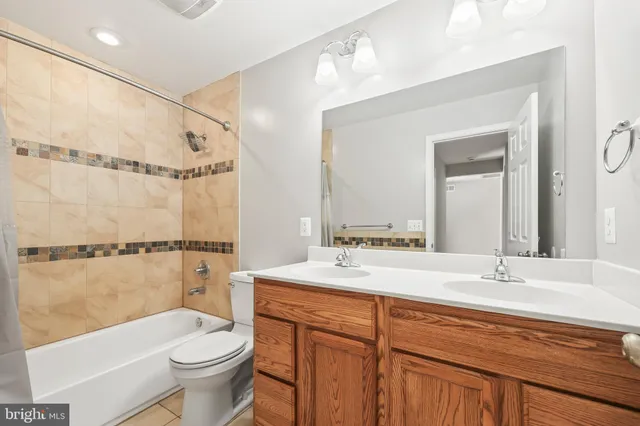 a view of a room with window and wooden floor