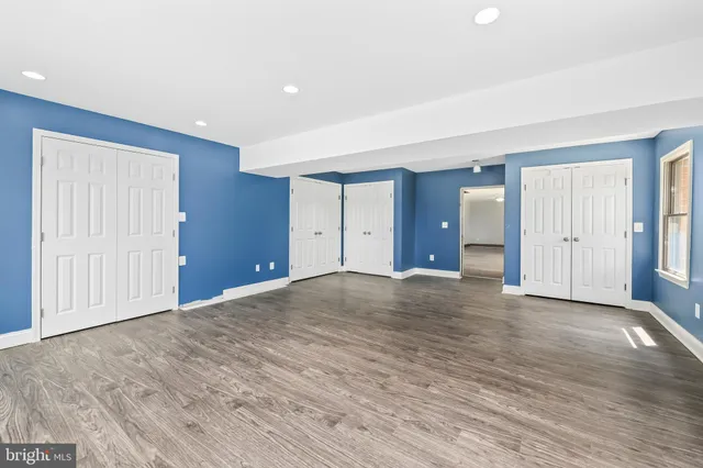 a kitchen with stainless steel appliances granite countertop a refrigerator and cabinets