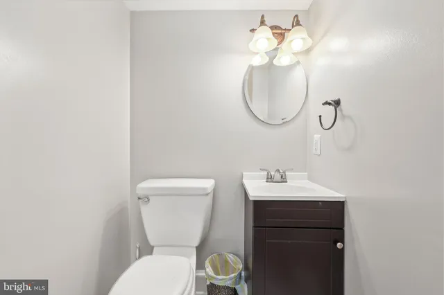 a view of a patio with table and chairs
