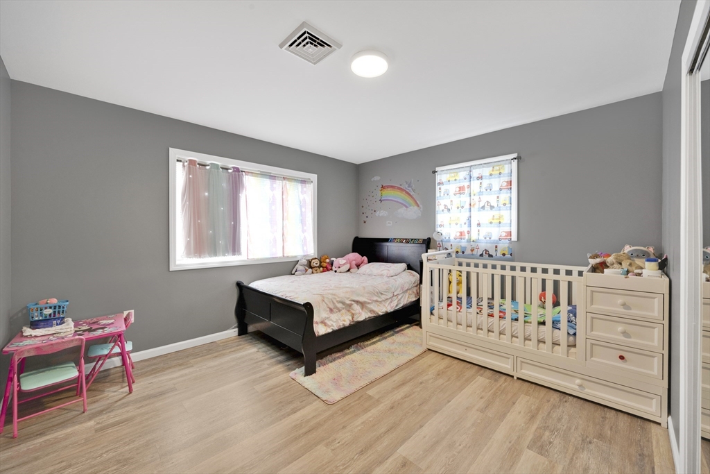 42 Ringgold Street Springfield, MA 01107 - Photo 27 of 38 a bedroom with a bed and a window