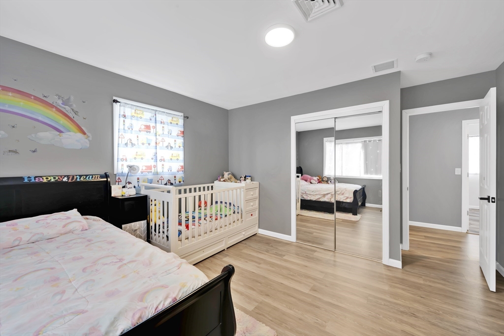 42 Ringgold Street Springfield, MA 01107 - Photo 28 of 38 a bedroom with furniture and a window