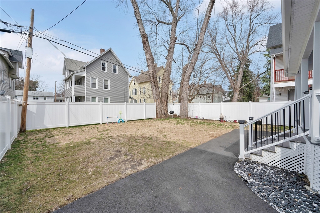 42 Ringgold Street Springfield, MA 01107 - Photo 38 of 38 a view of a house with a snow in the yard