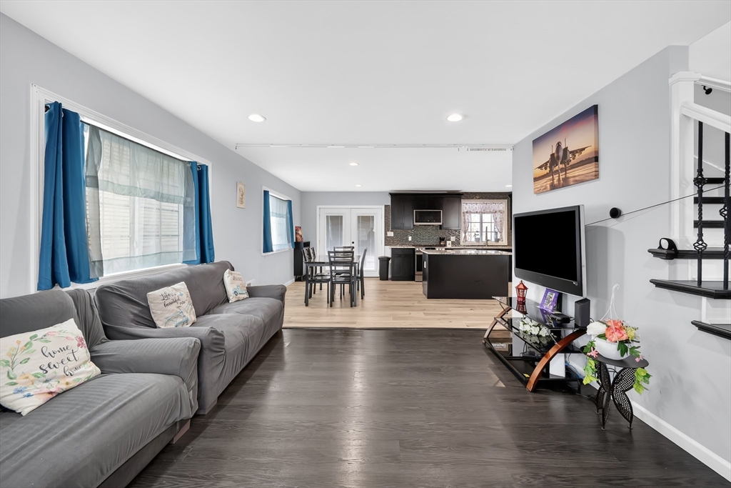 42 Ringgold Street Springfield, MA 01107 - Photo 5 of 38 a living room with furniture and a flat screen tv