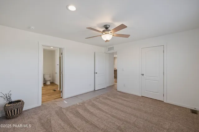an aerial view of a house with a ocean view