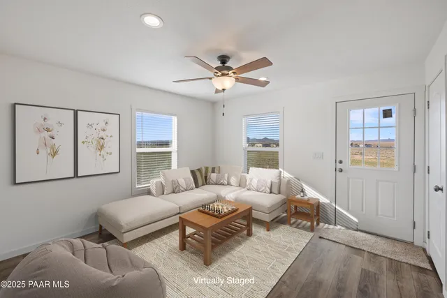 a kitchen with stainless steel appliances granite countertop a refrigerator sink and cabinets