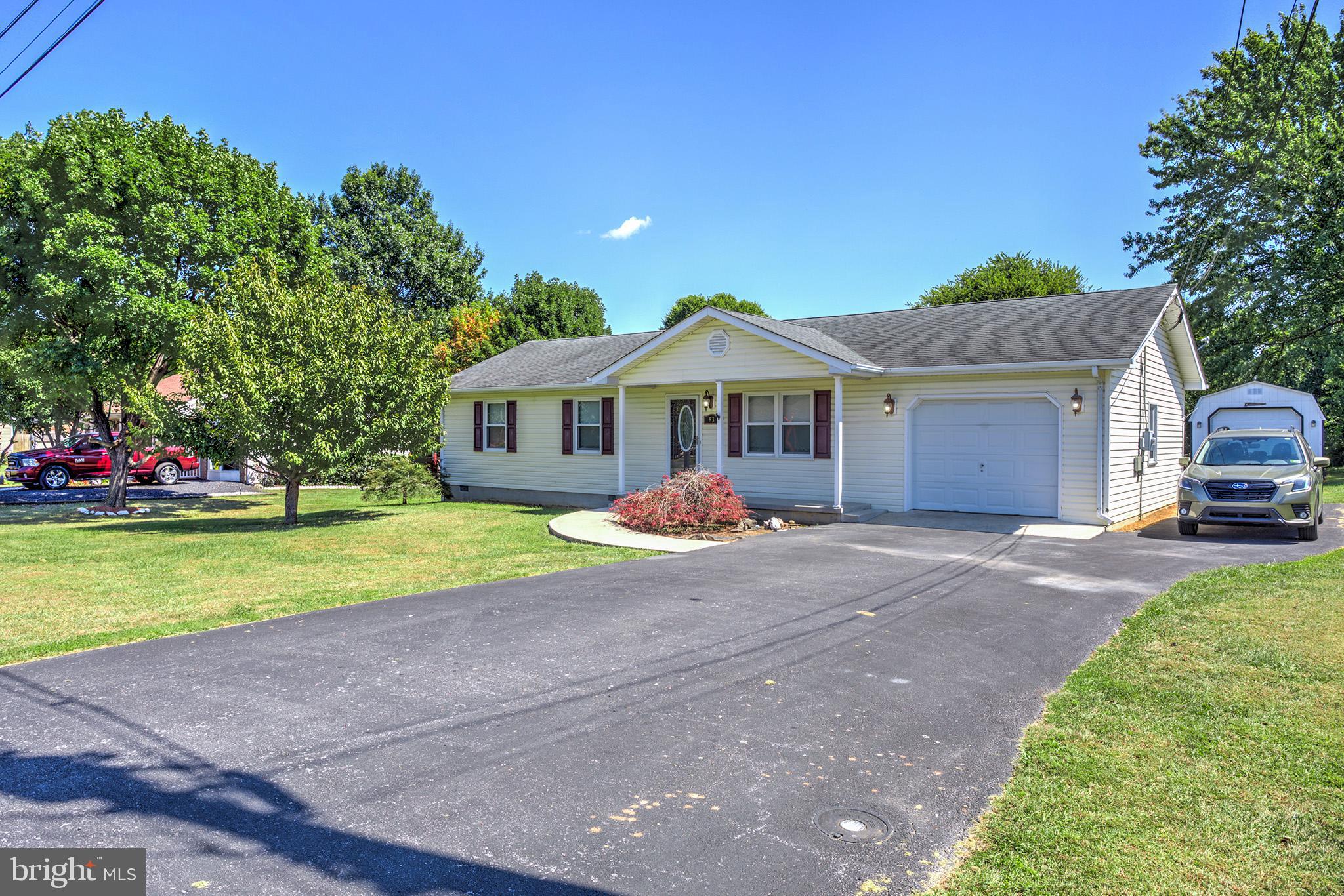83 Declaration Drive Inwood, WV 25428 - Photo 3 of 22 One Car Garage with plenty of parking