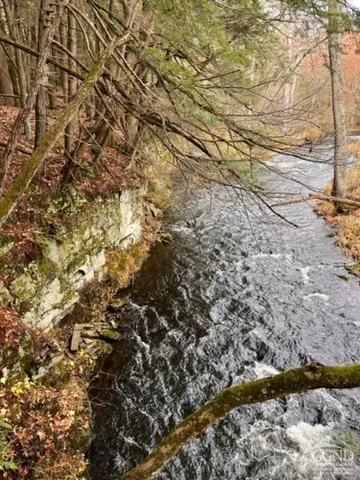 a fire hydrant in the middle of a field