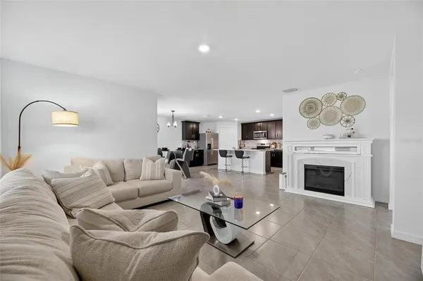 a dining room with furniture and window