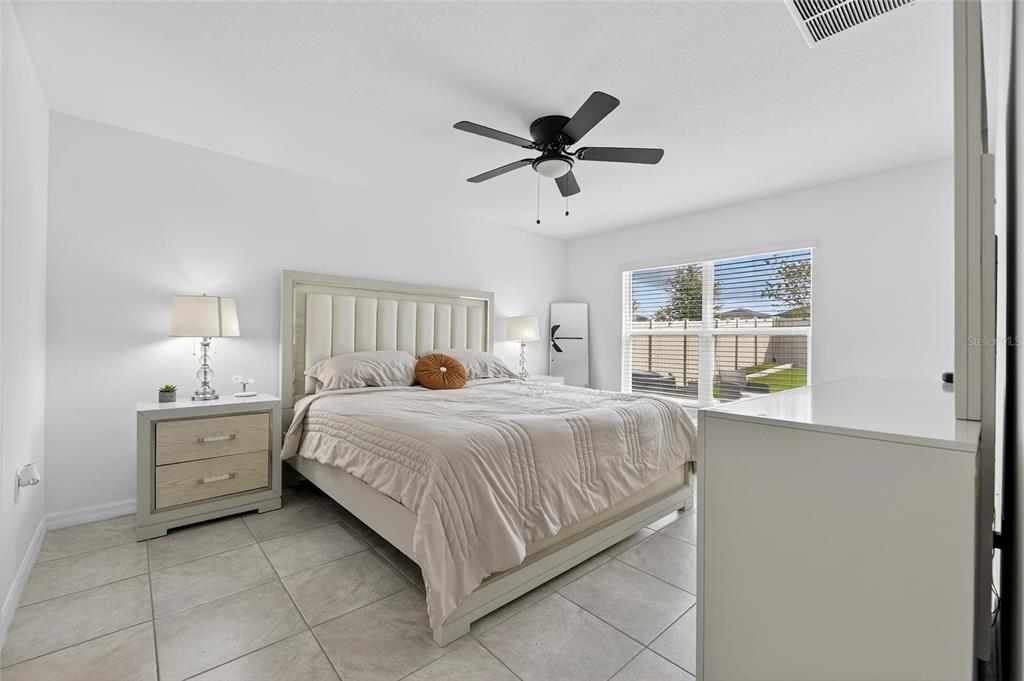 3602 Forest Path Drive Plant City, FL 33565 - Photo 35 of 75 a bedroom with a bed and a window