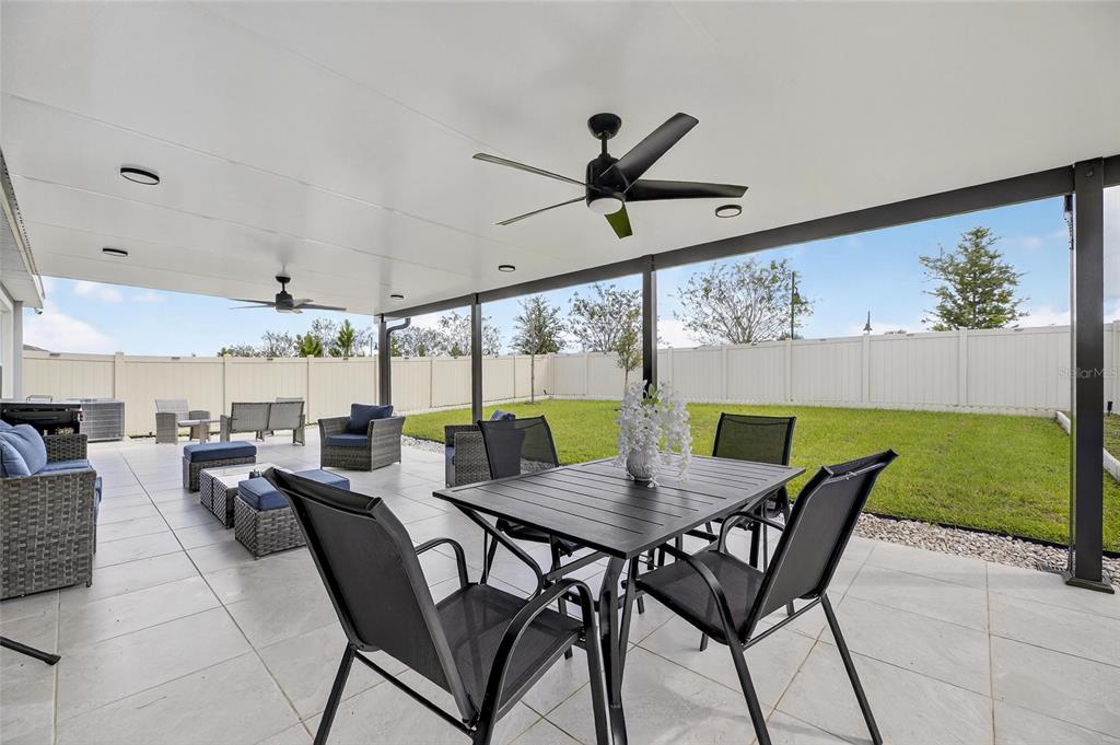 3602 Forest Path Drive Plant City, FL 33565 - Photo 4 of 75 a view of a dining room with furniture window and outdoor kitchen