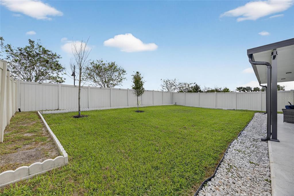 3602 Forest Path Drive Plant City, FL 33565 - Photo 49 of 75 a view of yard with swimming pool and seating space