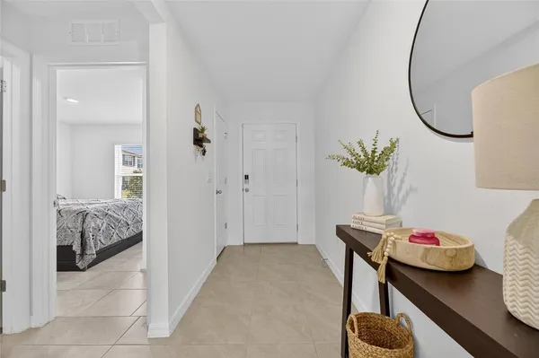 a bathroom with a sink a toilet and shower curtain