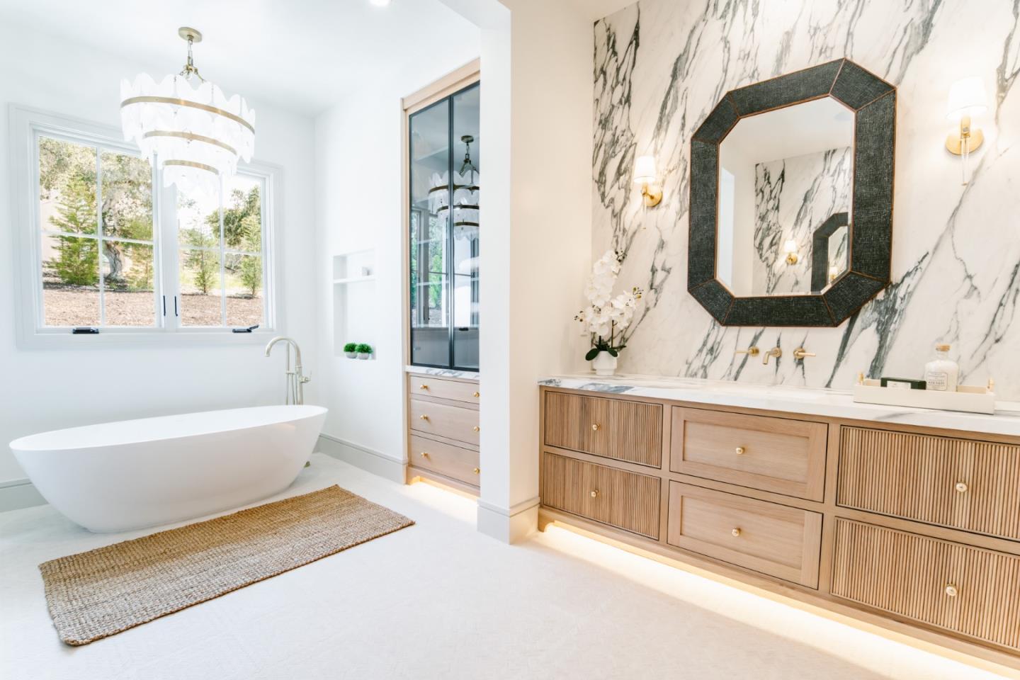 8210 Manjares Road Monterey, CA 93940 - Photo 45 of 76 a spacious bathroom with a double vanity sink and a mirror