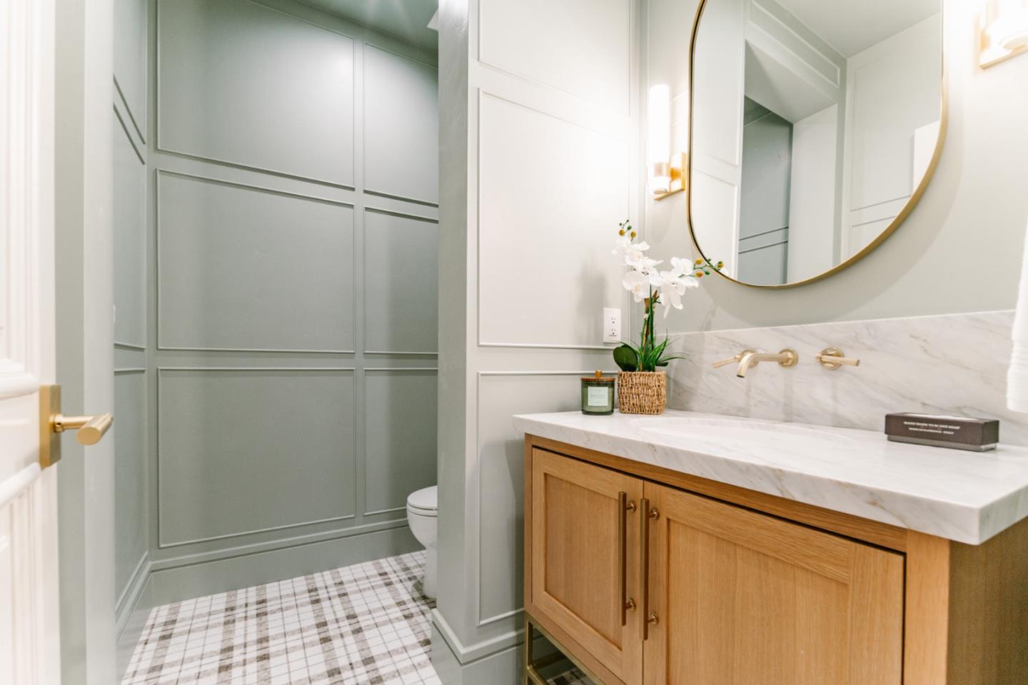 8210 Manjares Road Monterey, CA 93940 - Photo 57 of 76 a bathroom with a sink and a mirror