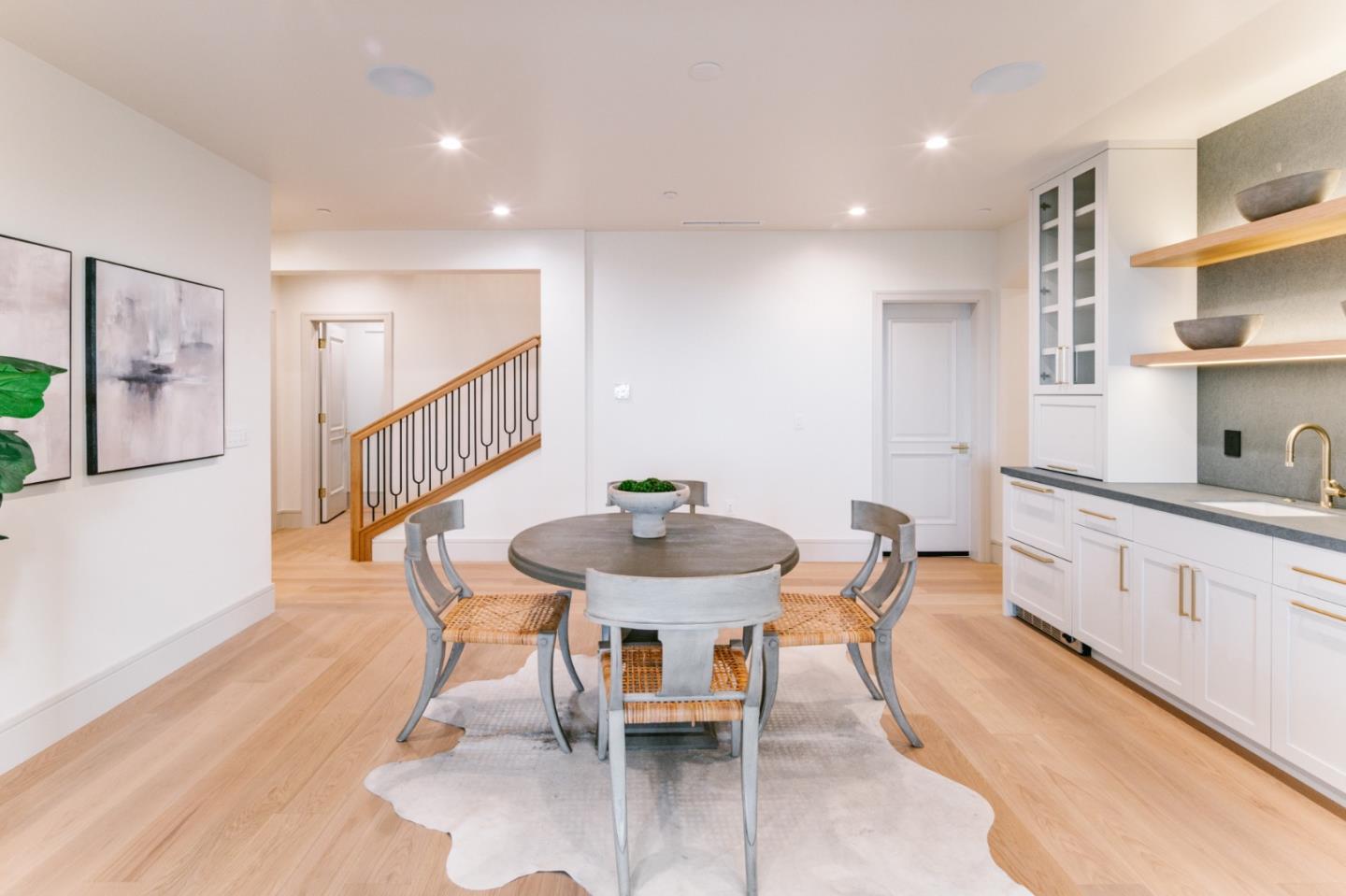 8210 Manjares Road Monterey, CA 93940 - Photo 60 of 76 a view of a dining room with furniture and wooden floor