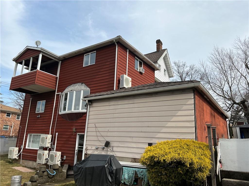 212 Manor Road Staten Island, NY 10314 - Photo 4 of 12 a view of a house with a yard