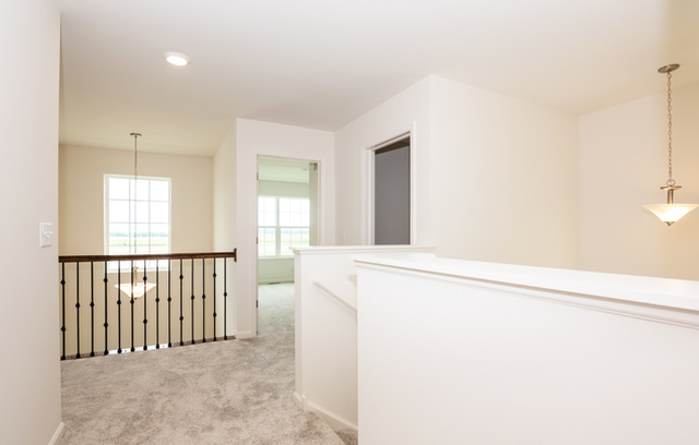 3628 Edelweiss Road Elgin, IL 60124 - Photo 9 of 38 a view of a hallway with windows