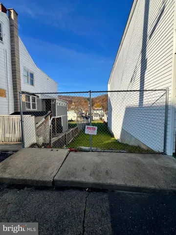 a view of a porch with a bench