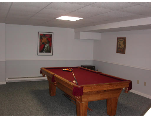 5 Baldwin Road Westford, MA 01886 - Photo 11 of 28 a room with gym equipment