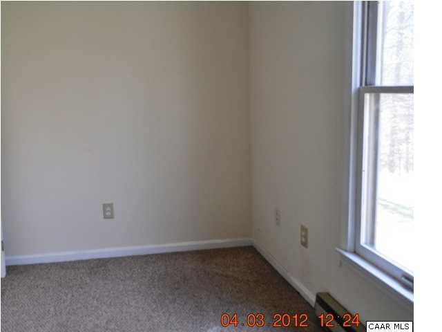 7972 Chestnut Grove Road Esmont, VA 22937 - Photo 7 of 7 a view of an empty room and a window