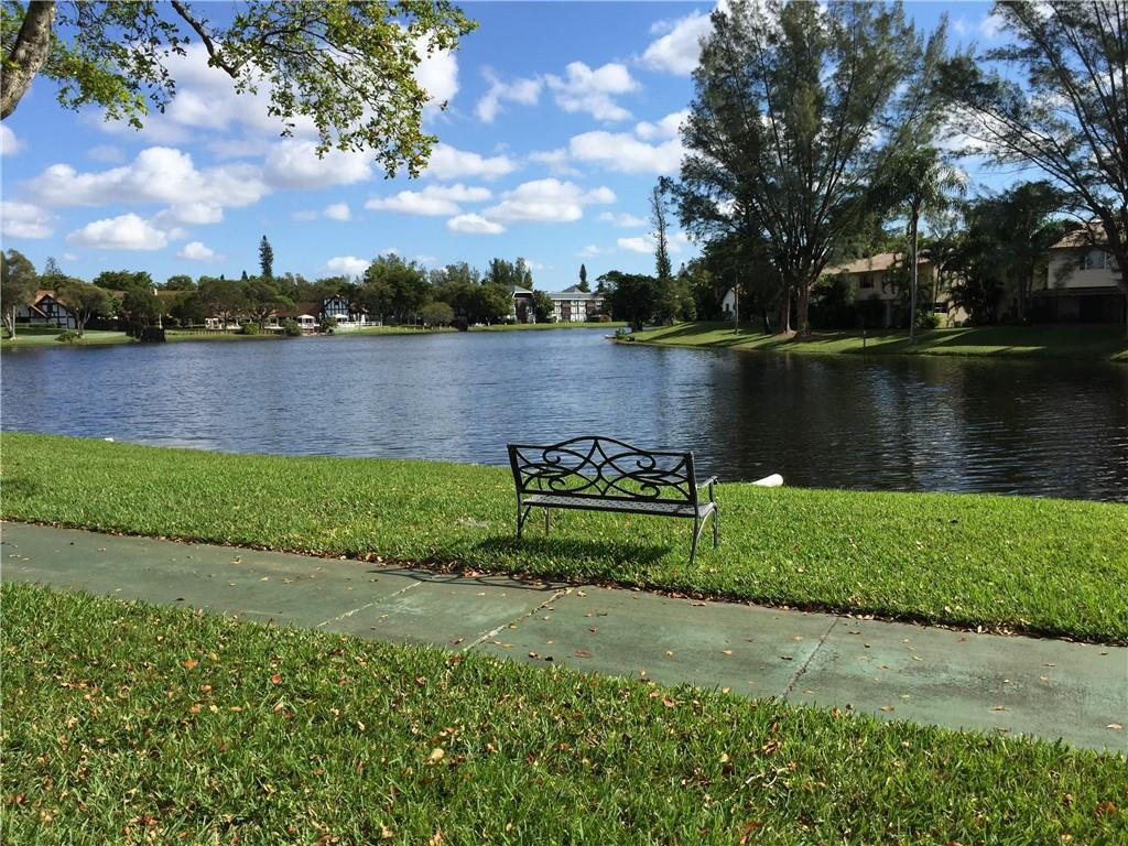 3670 Inverrary Drive, Unit 1E Lauderhill, FL 33319 - Photo 11 of 15 a view of a lake