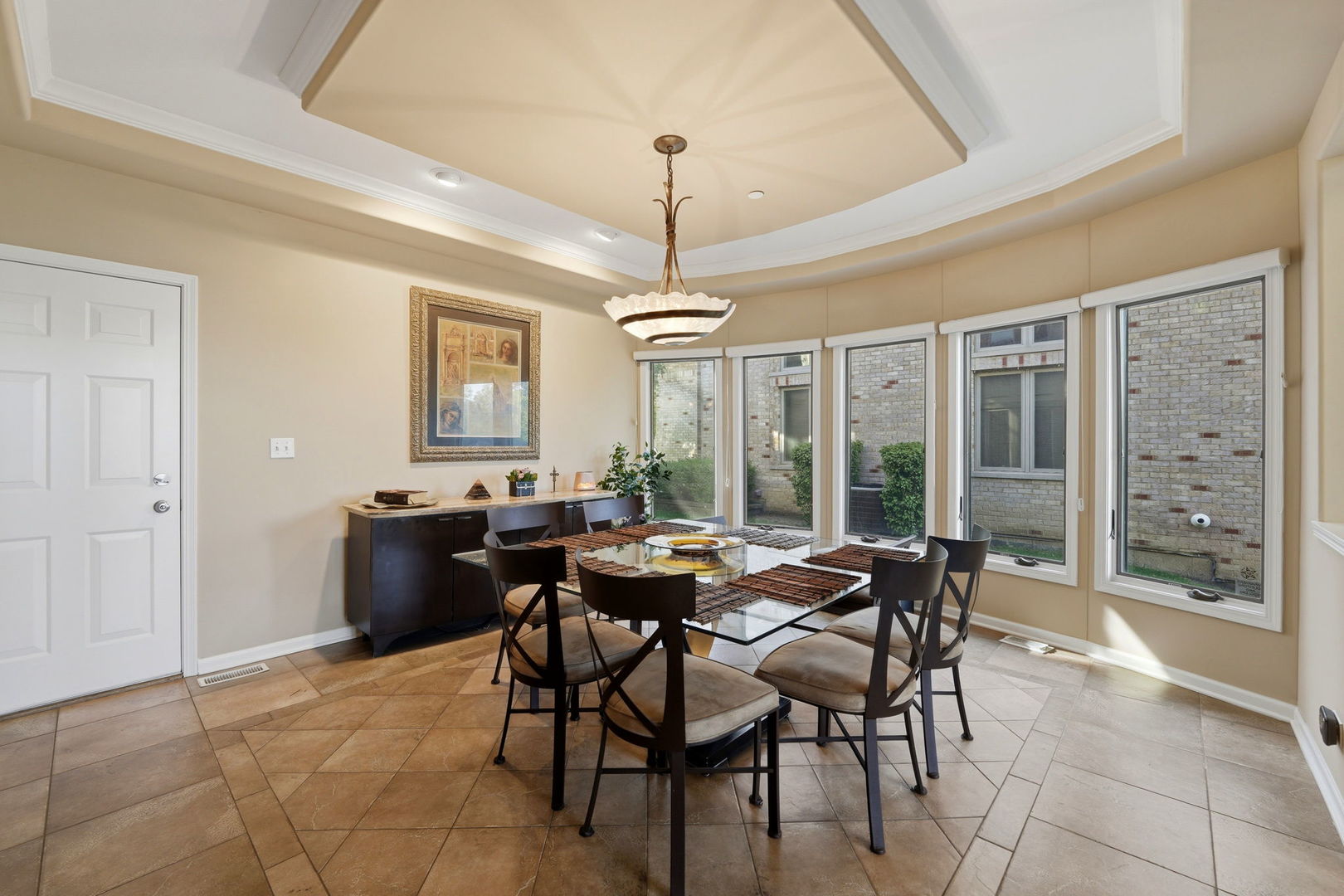 1406 Rue Paris Place Inverness, IL 60067 - Photo 10 of 35 a view of a dining room with furniture window and outside view