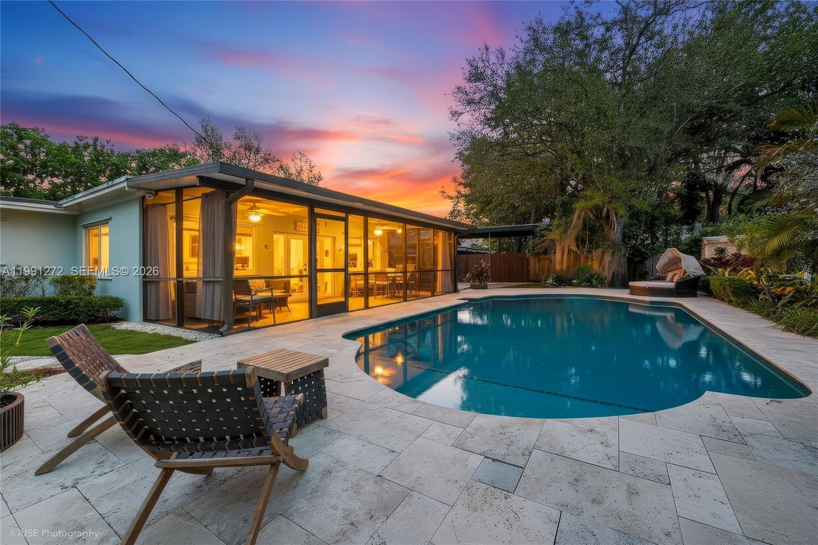 8535 Southwest 97th Road Miami, FL 33173 - Photo 2 of 28 a view of swimming pool with outdoor seating and plants