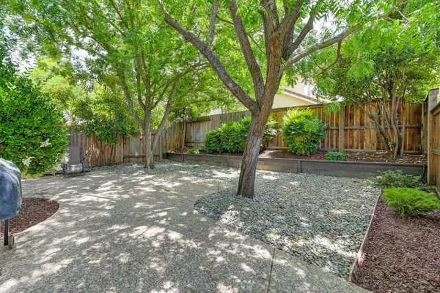 a backyard of a house with lots of green space