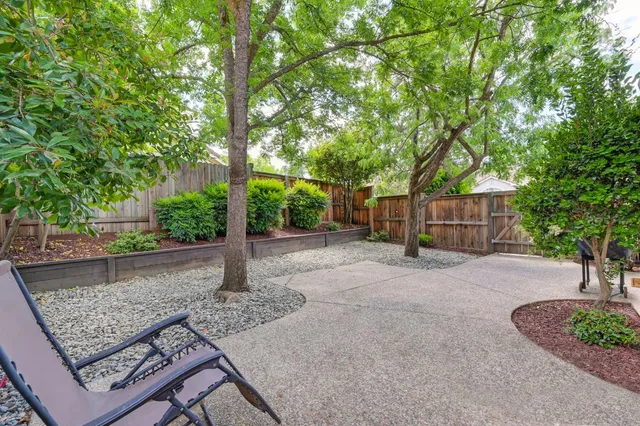 a view of a backyard with green space