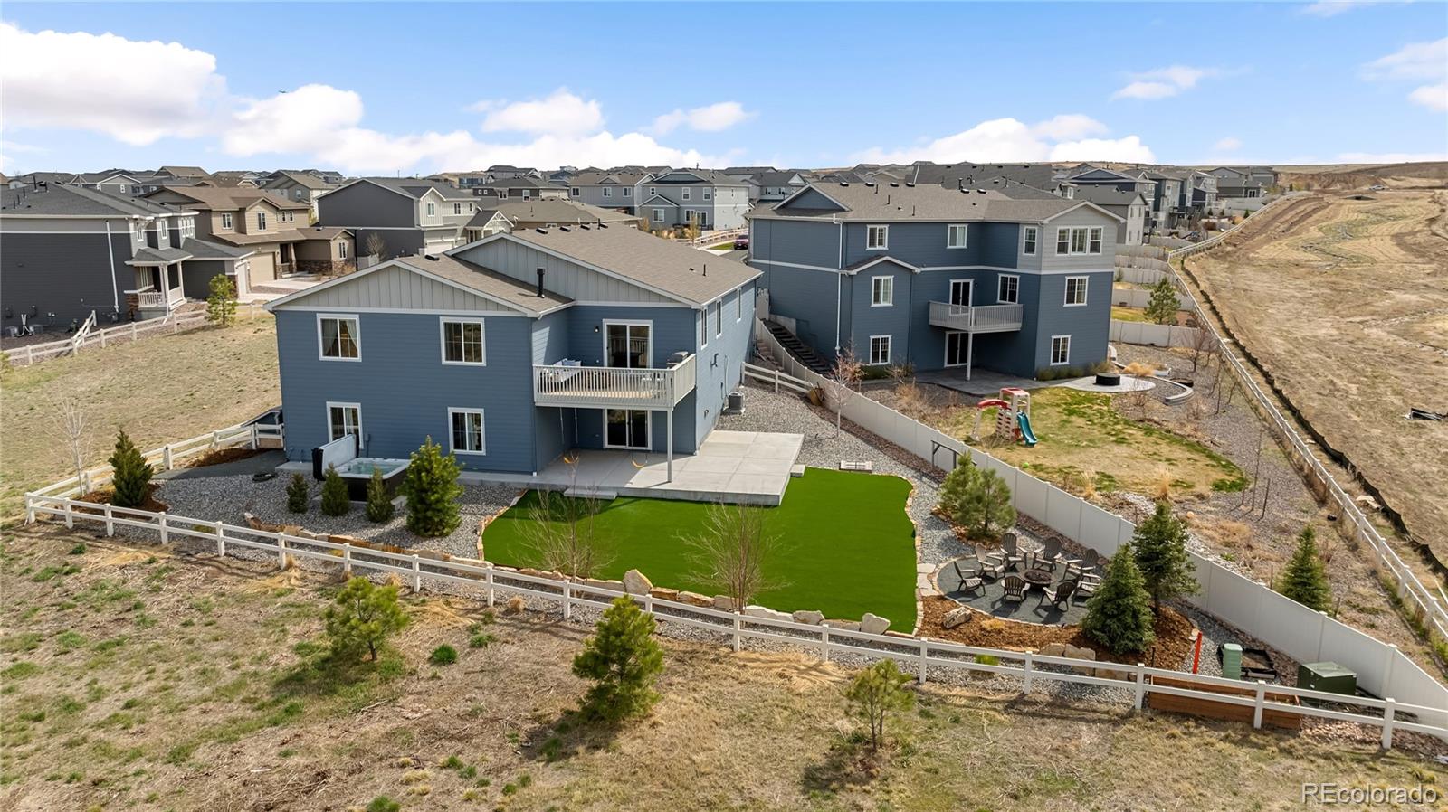 12649 Buffington Trail Parker, CO 80134 - Photo 2 of 47 an aerial view of residential houses with outdoor space