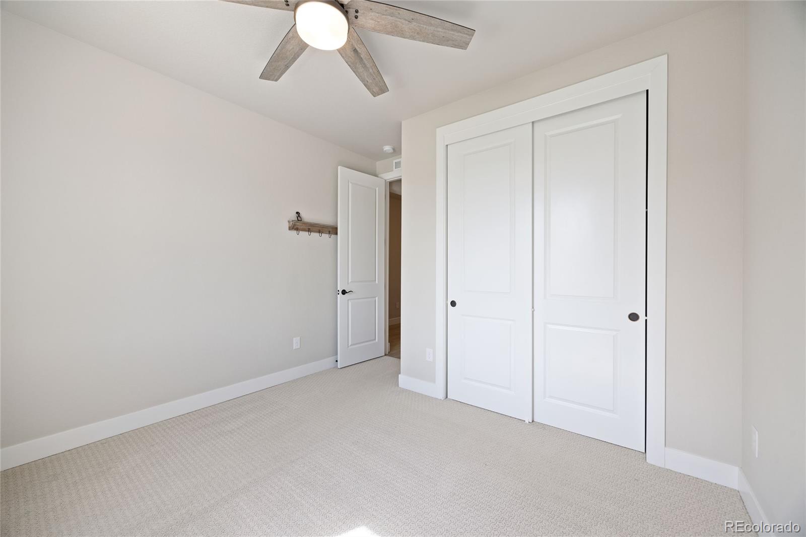 12649 Buffington Trail Parker, CO 80134 - Photo 25 of 47 a view of an empty room and window